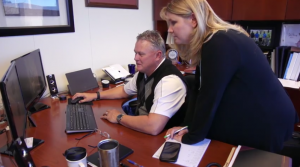 Vicki Myers working with a fellow employee