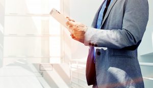 Employee reading information from a tablet